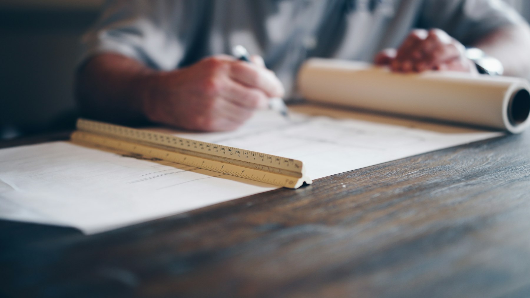 Drawings being marked up with a scale ruler